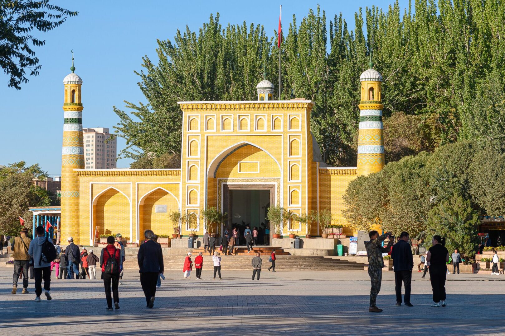 Visitors outside Kashgar’s Id Kah Mosque