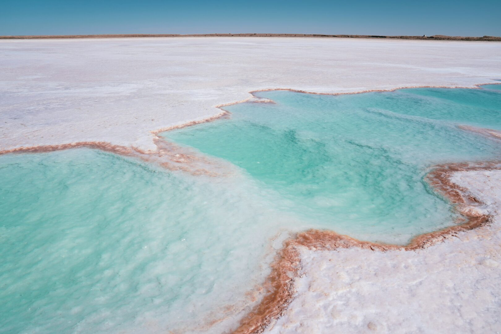 Turquoise pools and white salt flats