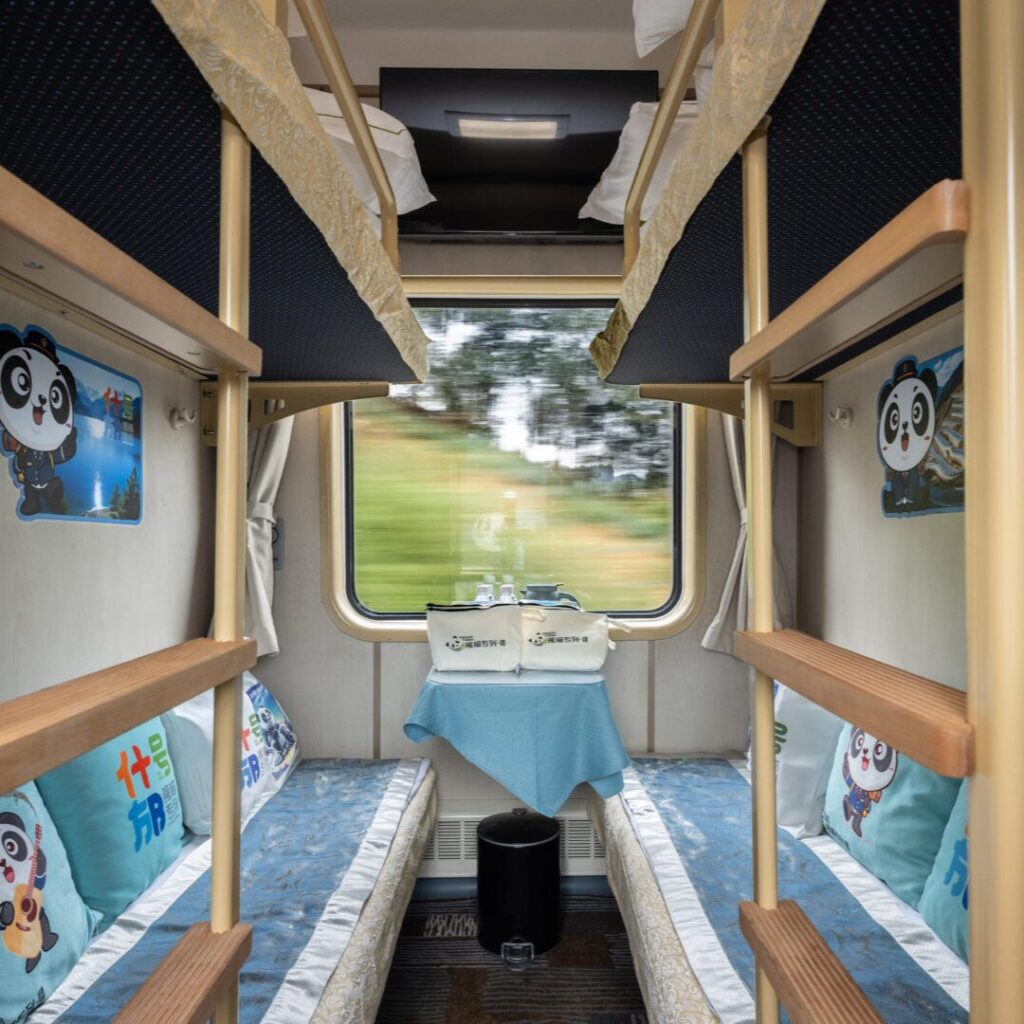Shared four-berth compartment aboard Panda Express–Shifang